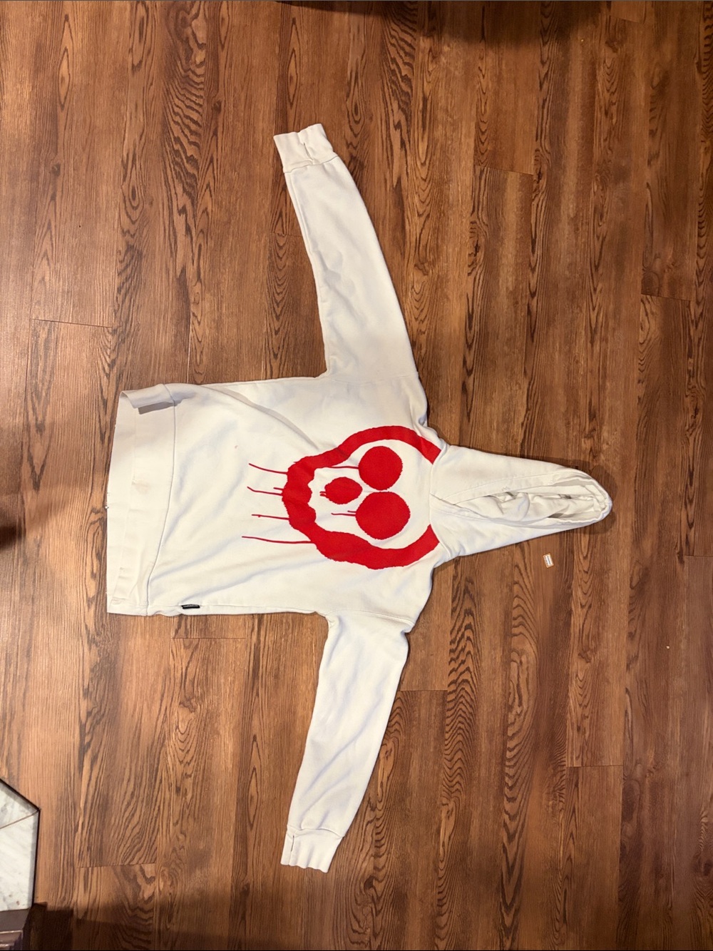 Nununu Kids White Hoodie with Red Graphic Skull Design